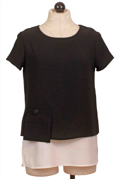 Crepe Black Short Sleeve Top Layered over a White Tank by Compli K 