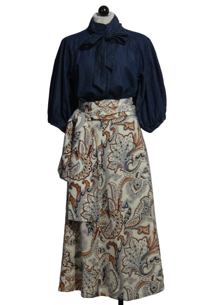 The Estine Wrap Skirt by Marie Oliver in the Trinity Paisley Print paired with the Chambray Navi Top by Marie Oliver