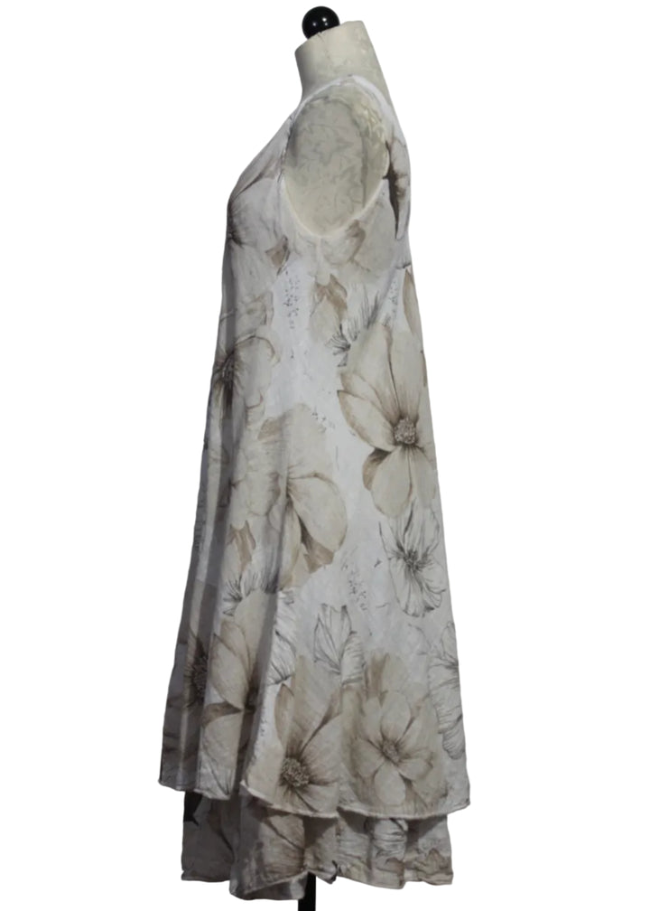 side view of Beige Sleeveless Cotton V Neck Floral Dress by Bella Amore with a longer ruffle bottom slip