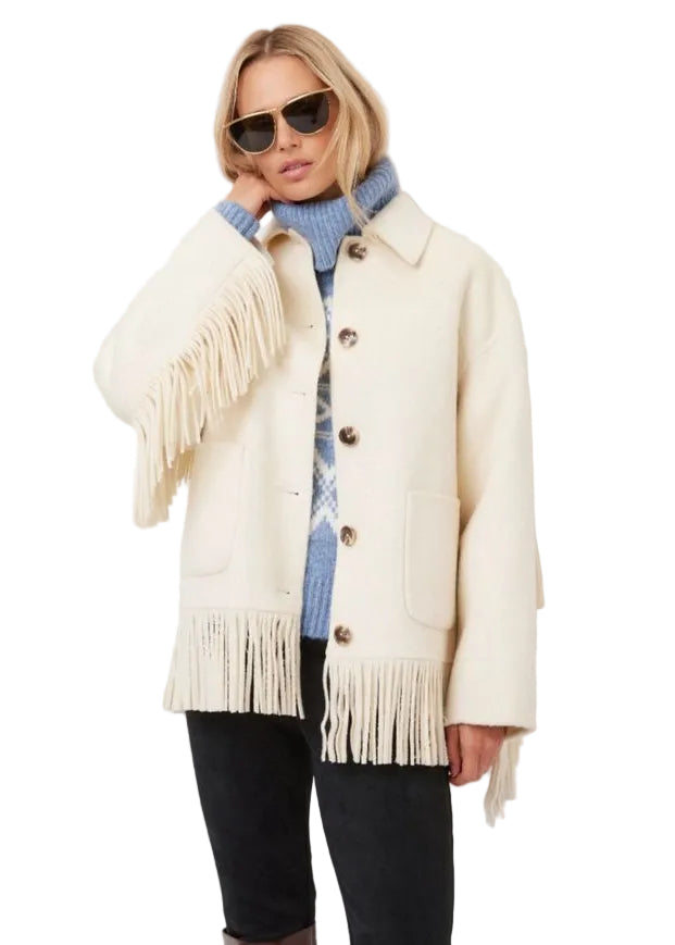 model wearing the Cream colored Yara Fringe Jacket by Fifteen Twenty