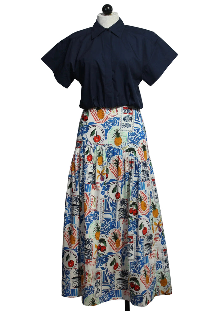 Vicki Skirt by Marie Oliver in the Postcard Print paired with the elastic waist Navy Sierra Top by Marie Oliver