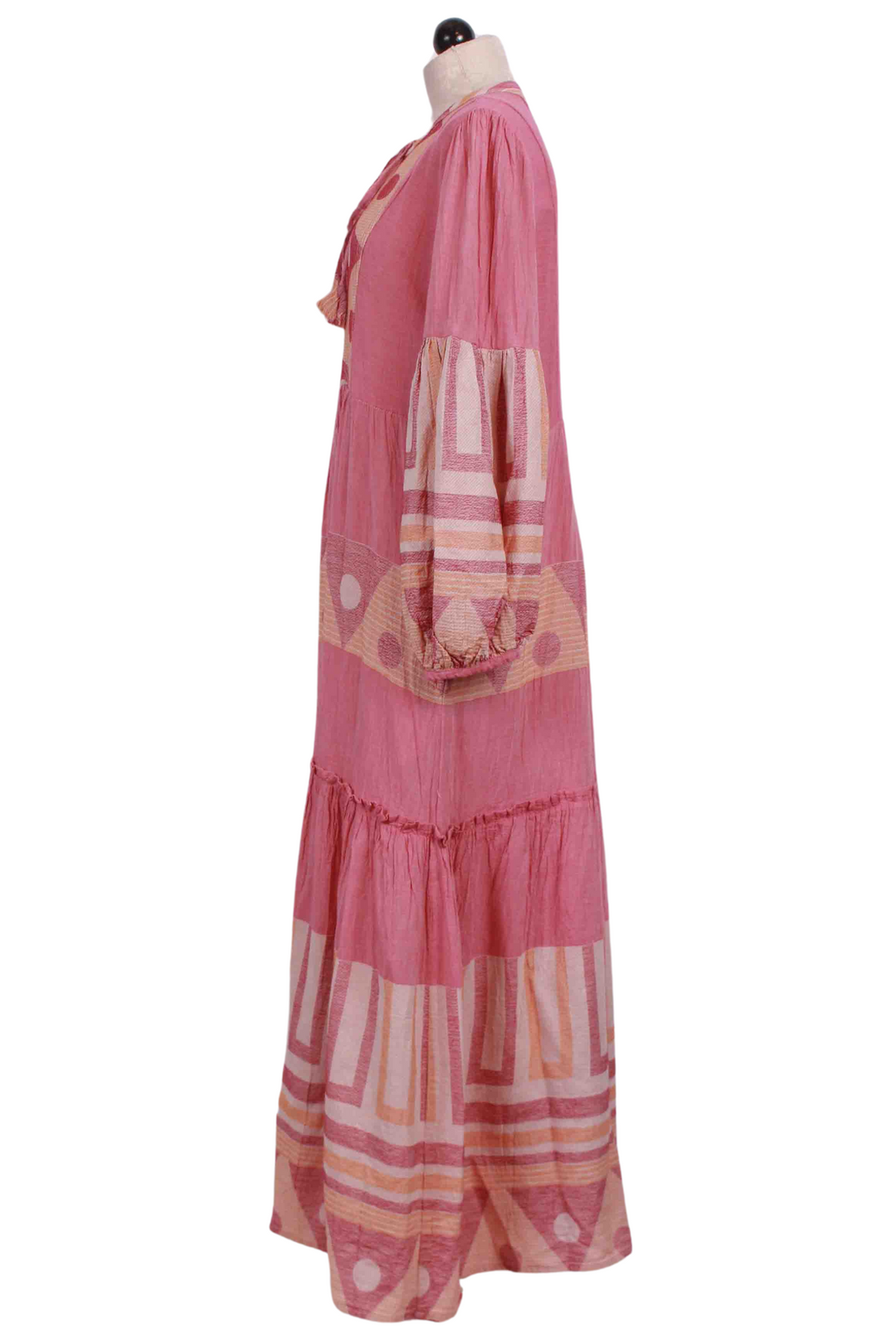 side view of Fuchsia Tiered Zakar Maxi Dress by Pearl & Caviar