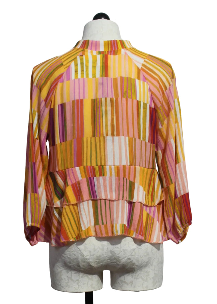 back view of Multicolored  Zip Front Striped Jacket with Tiered Ruffle Bottom by Aldo Martins 