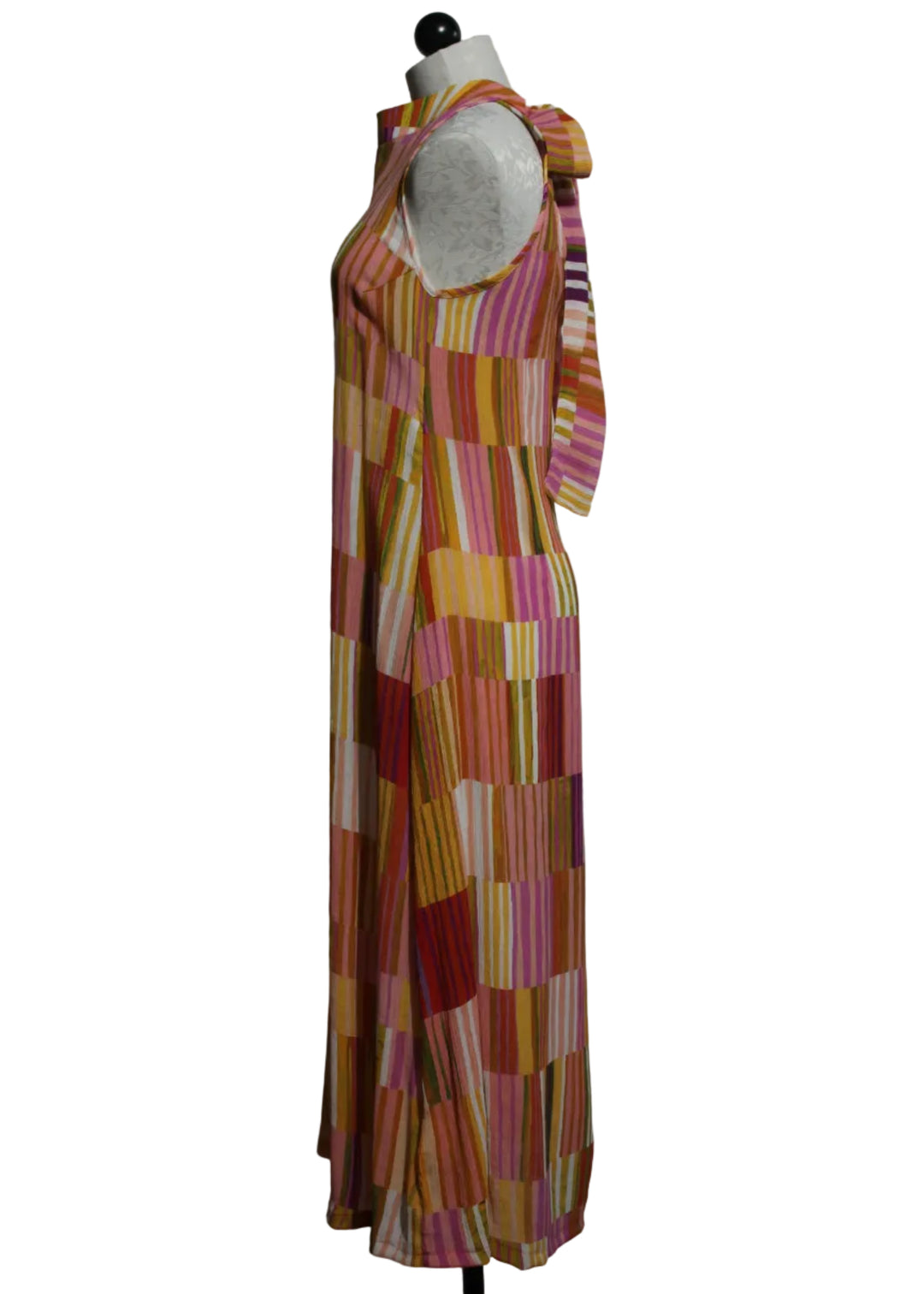 side view of The Sleeveless Striped Tie Back Midi Dress by Aldo Martins