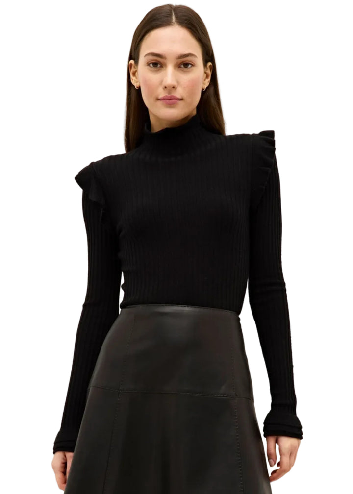 model wearing the BLACK ribbed Tinley Turtleneck by Marie Oliver