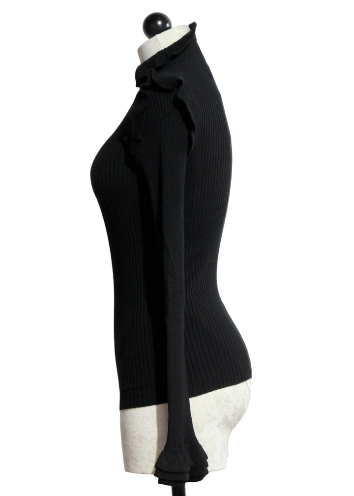 Side view of the BLACK ribbed Tinley Turtleneck by Marie Oliver