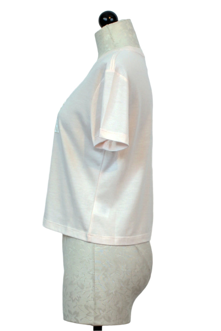 side view of  Rosewater with Snow White Cropped Collegiate Tee by Favorite Daughter 