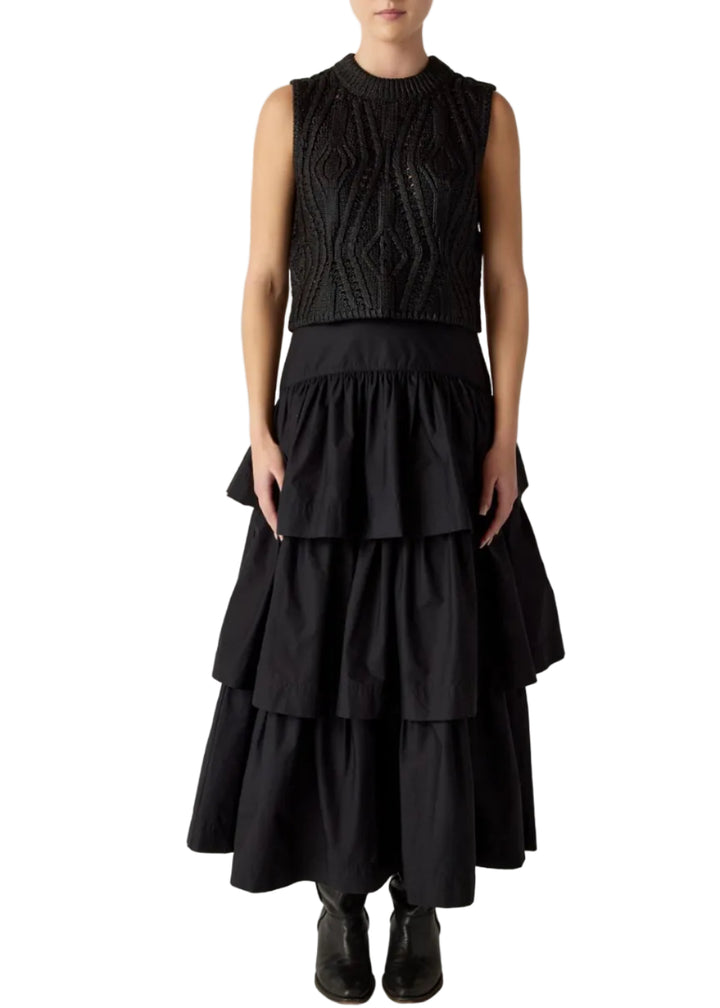 model wearing the MCGUIRE TOP by Marie Oliver in Black paired with the Marie Oliver Black Baylor Skirt