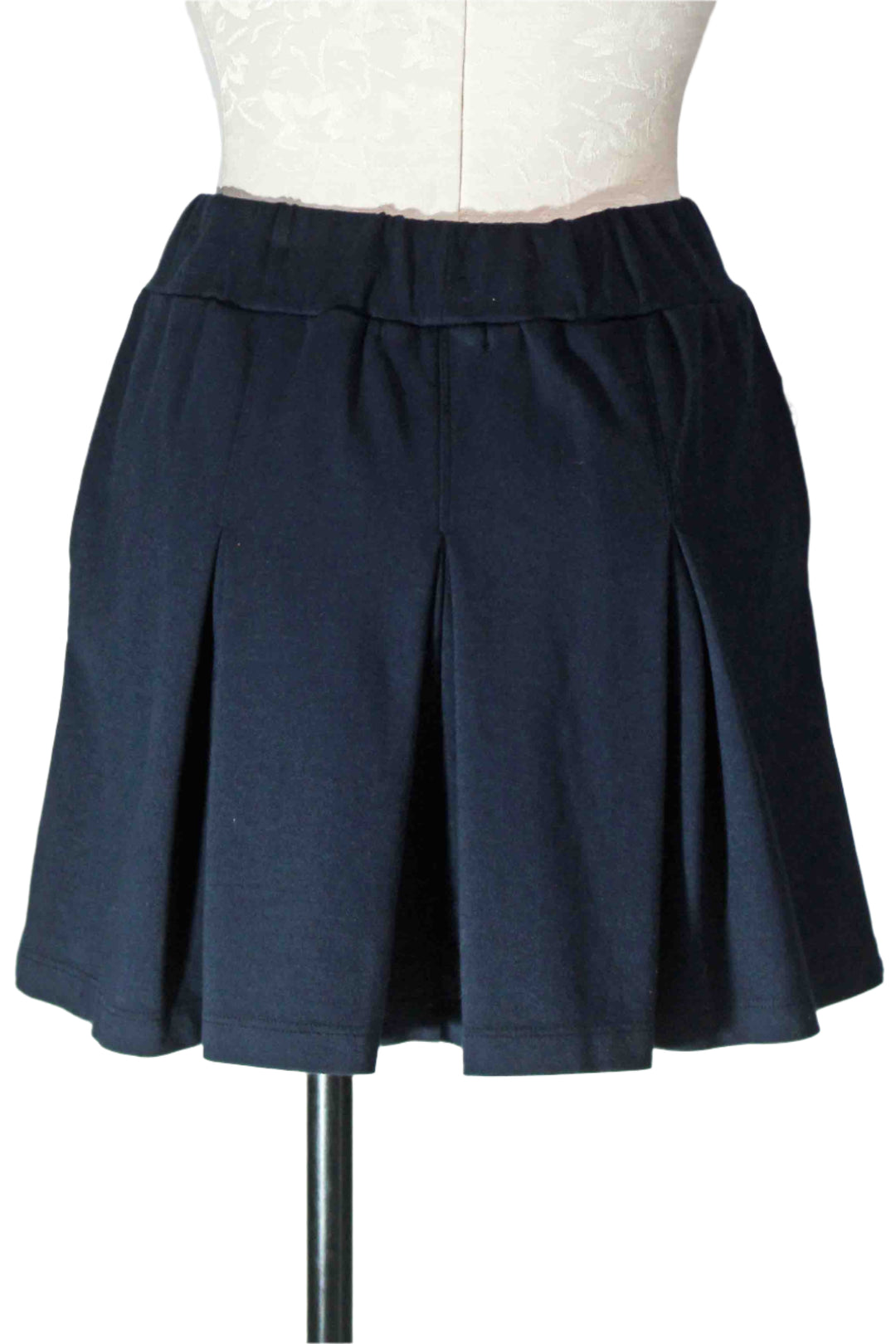 back view of New Navy Ponte Pleated Mini Skirt by Stateside 