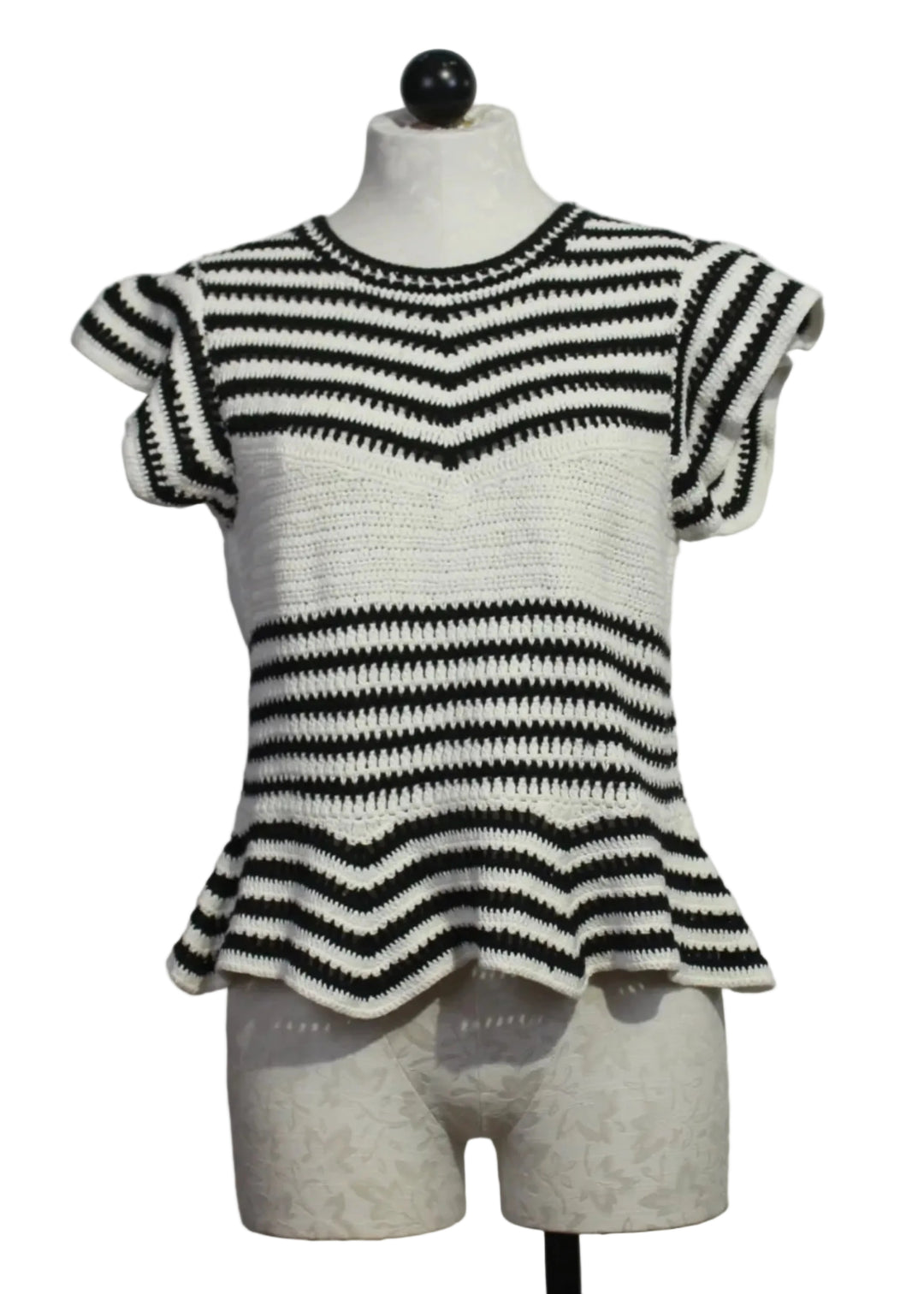 The knit Regatta Knit Black and White Striped Audrey Top by Marie Oliver with ruffled shoulders and a peplum bottom