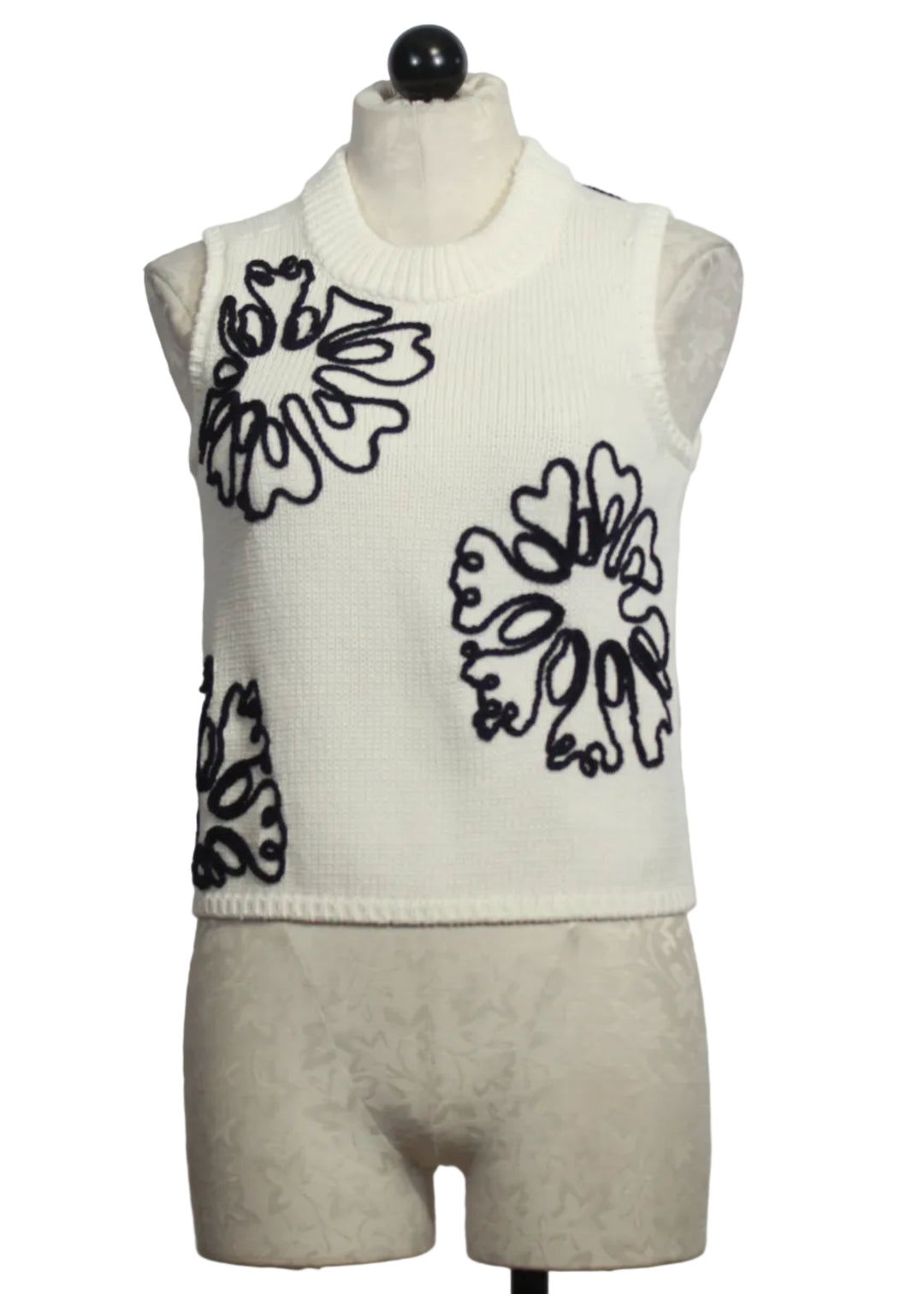 Cream colored Sleeveless Natasha Top by Marie Oliver with Navy Embroidered Flowers
