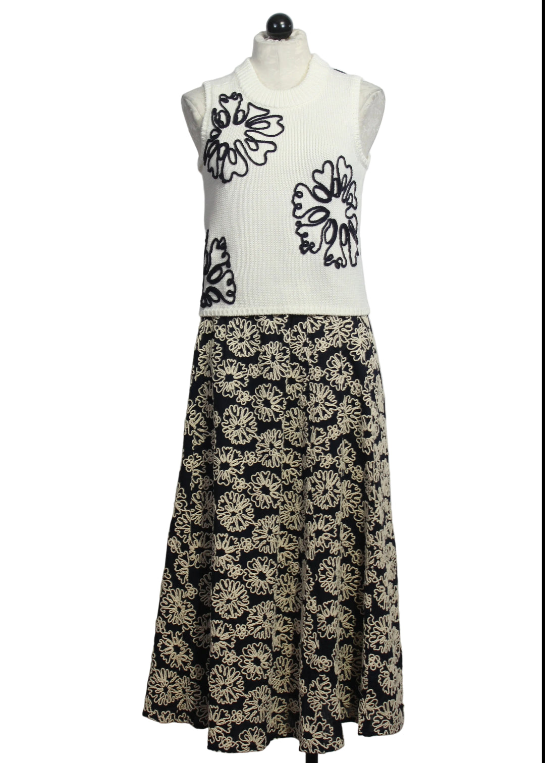 Cream colored Sleeveless Natasha Top by Marie Oliver with Navy Embroidered Flowers paired with the matching Blossom Sasha Skirt by Marie Oliver