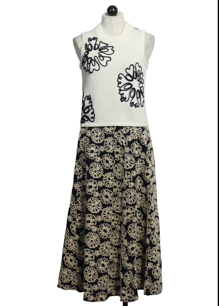 Cream colored Sleeveless Natasha Top by Marie Oliver with Navy Embroidered Flowers paired with the matching Blossom Sasha Skirt by Marie Oliver