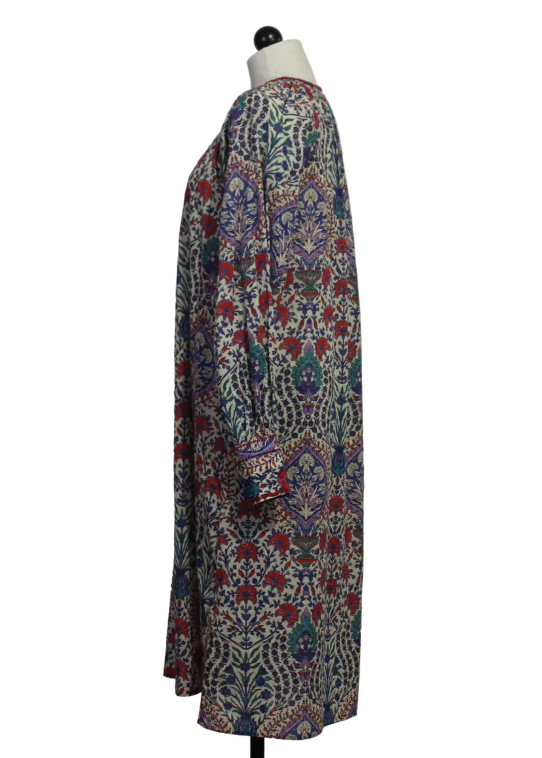 side view of The long sleeve cotton floral Riffy Dress by MKT Studio