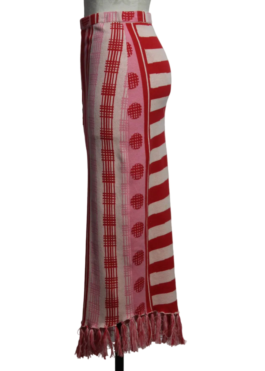 side view of Peach Jubilee colored Cotton Capri Knit Skirt by Emily McCarthy with fringed bottom