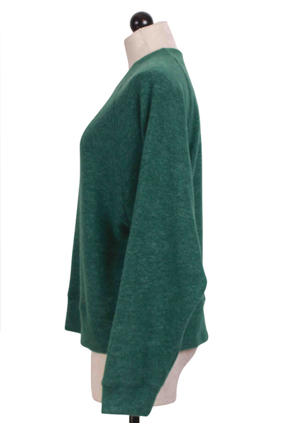 side view of Evergreen Brushed Long Sleeve Crew Neck Top by Nally and Millie