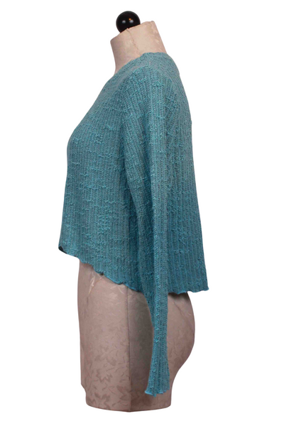 side view of Poolside Curved Crop Sweater by Cut Loose