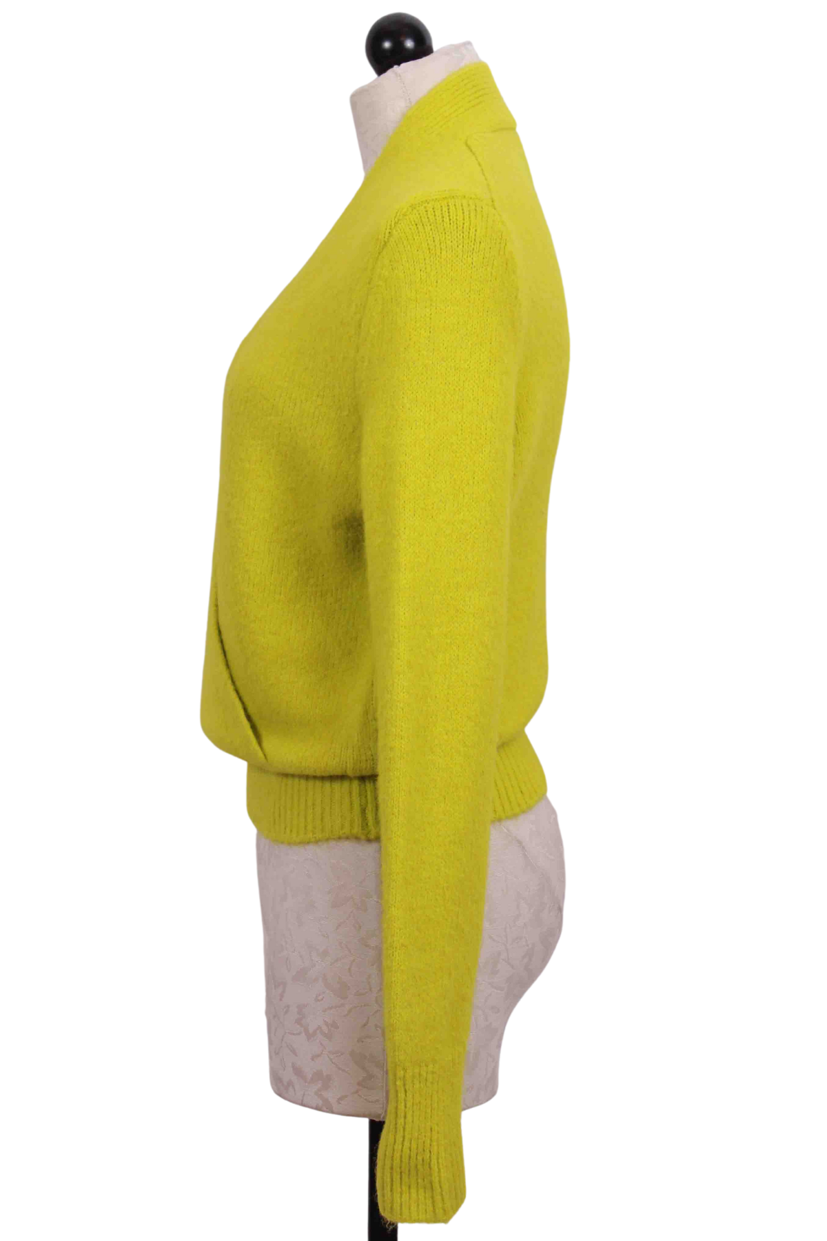 side view of Lime Colored Wrap Front Sweater by Fifteen Twenty with a Ribbed Hem