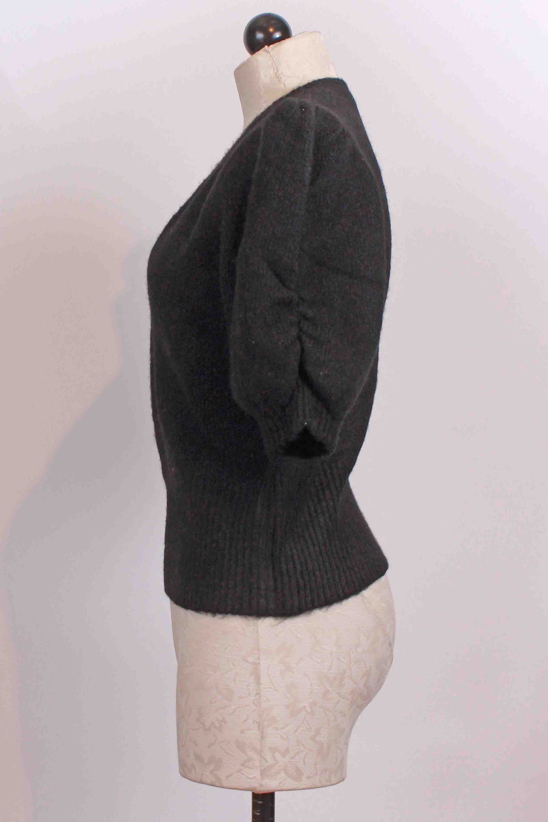 side view of Black colored Bennett Shirred Sleeve Sweater by Fifteen Twenty