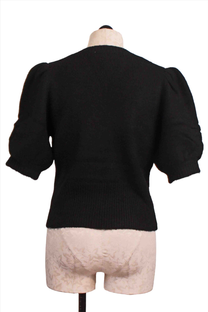 back view of Black colored Bennett Shirred Sleeve Sweater by Fifteen Twenty