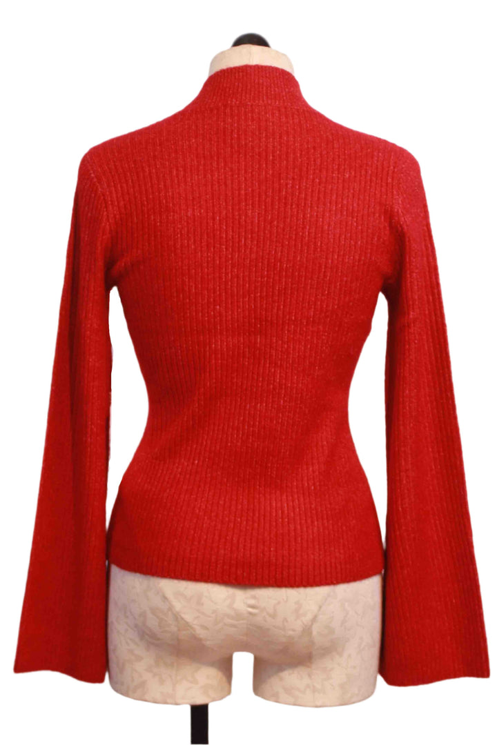 back view of Red Ribbed Brielle Flare Sleeve Sweater by Fifteen Twenty