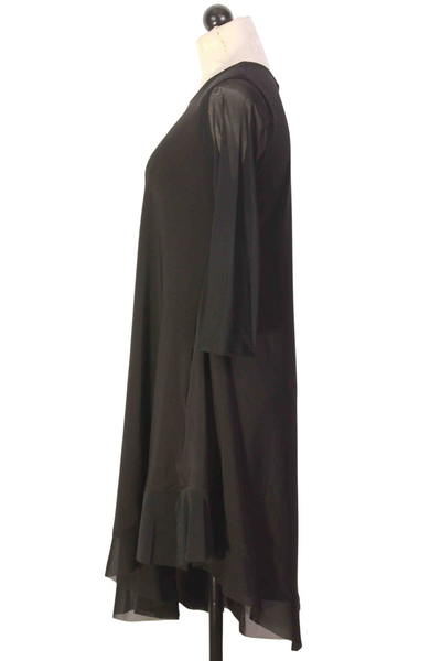 side view of Black Mesh Curved Hem Dress by Reina Lee