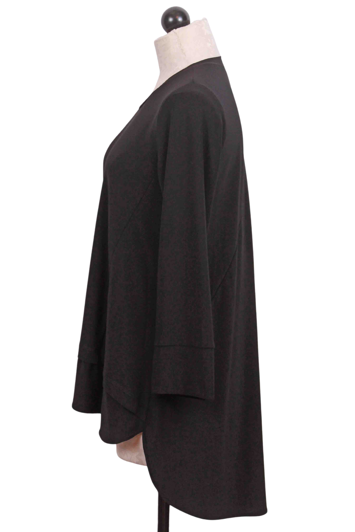 side view of black Top by Reina Lee with Decorative side Zipper on High-Low Hem
