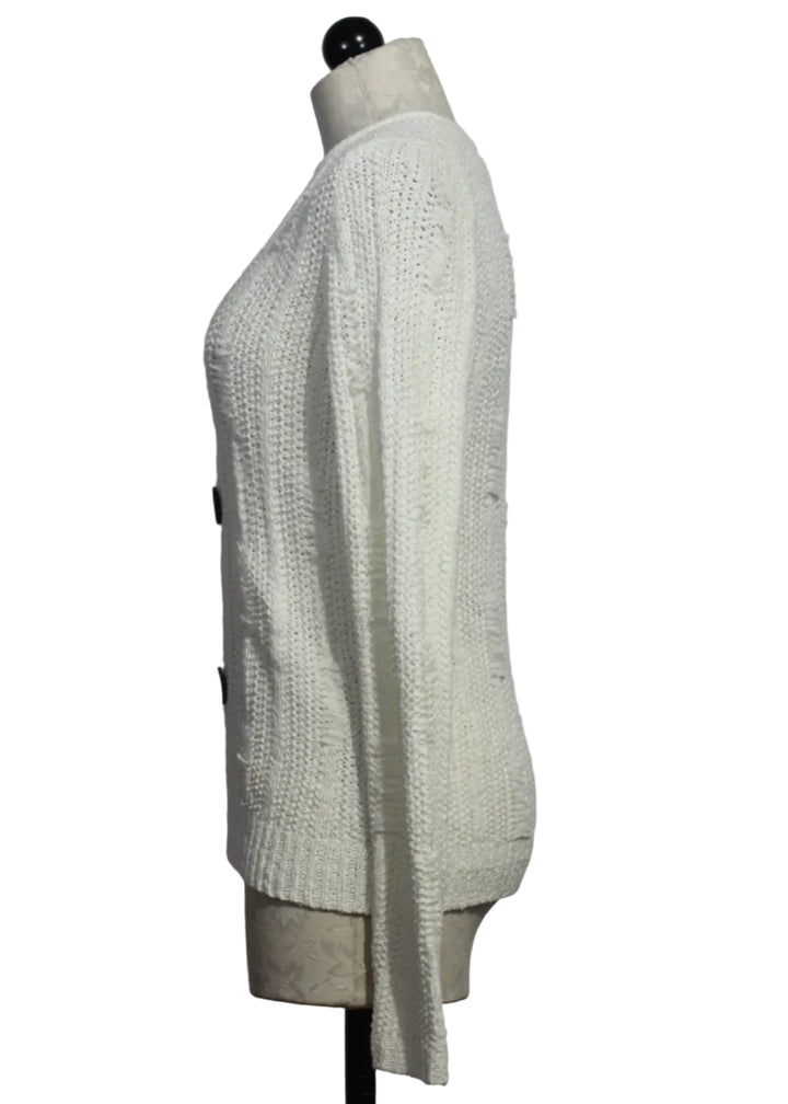 side view of Off-White Three-Button V-Neck Sweater by Alison Sheri 