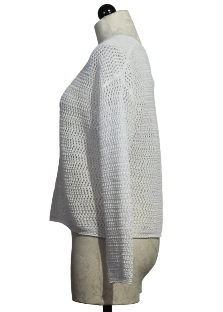 side view of White Long Sleeve Open Weave Sweater by Alison Sheri