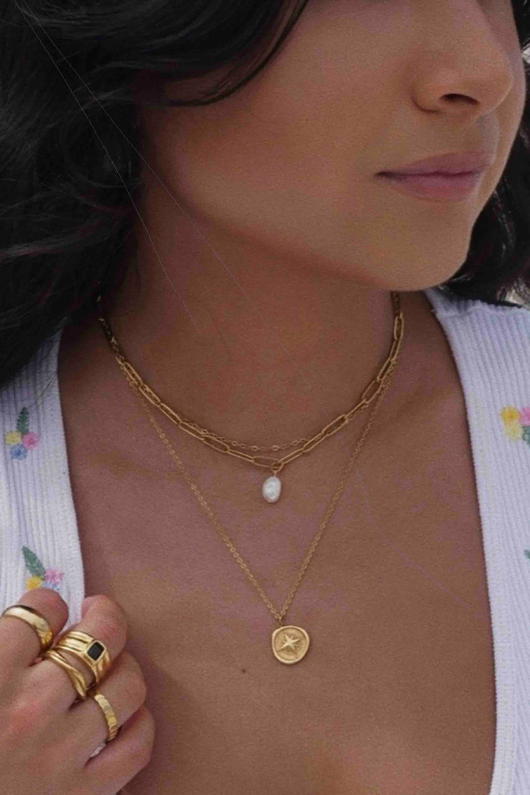 model wearing the Gold Aerin Compass Pendant Necklace by Ellie Vail 