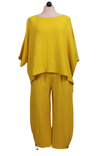 Lime Andi Gauzy Cotton Pant by Kozan that gathers down at the ankle with a pull-tie paired with the matching Alina oversized Hi Lo top by Kozan