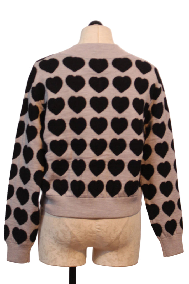 back view of Silver All Heart Zip Front Sweater by Lisa Todd with Black Hearts