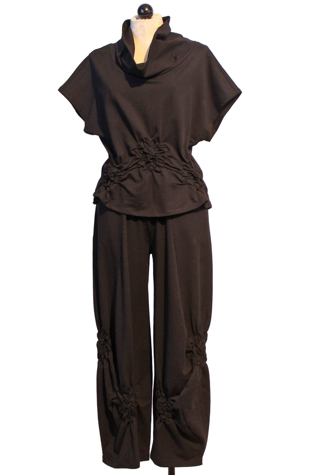 Almila Pant by Kozan with ruched rosette-like detail along the bottom paired with the matching Roygen Top by Kozan