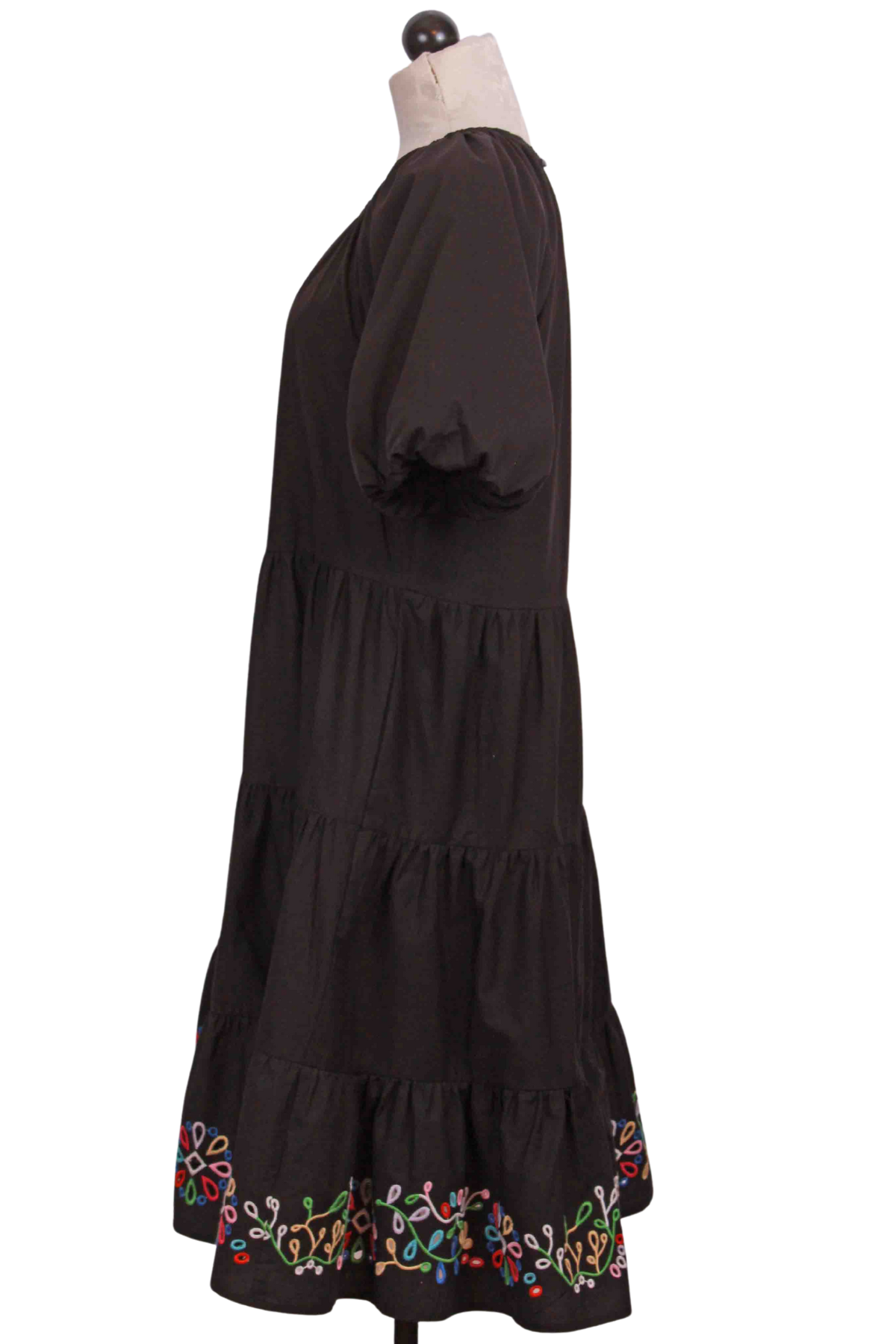 side view of Black Amanza Tiered Dress by Johnny Was with embroidered hem