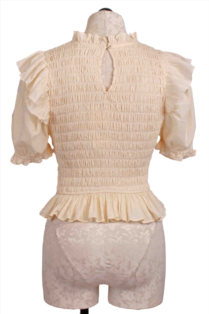 back view of Pale Champagne Amelie Top by Cleobella