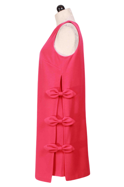 side view of Hibiscus Sleeveless Arlette Dress by Trina Turk with 3 bows on the sides