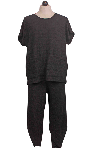 black Short Sleeve V Neck Waffle Fabric Top by Inoah paired with the matching Inoah Waffle pant