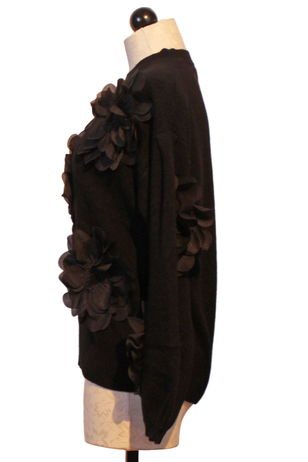 side view of Black Round Neck 3D Applique Sweater by Jessie Liu