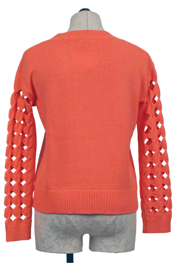 back view of Neon Orange After Hours Sweater by Lisa Todd