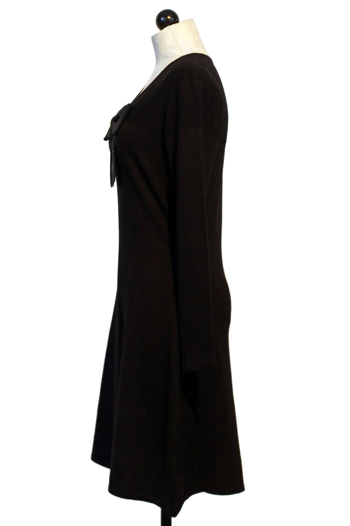 side view of Black Sequined Bow Flared Dress by Leo & Ugo