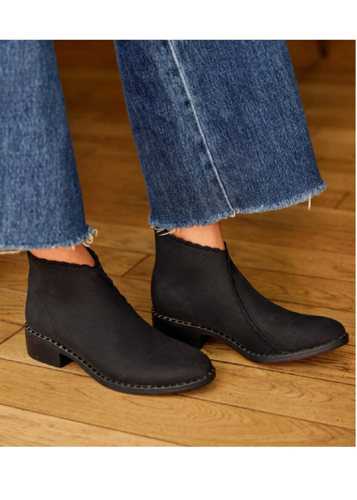 Model Wearing the Black Ruffle Barcelona Boot by Charleston Shoe Company