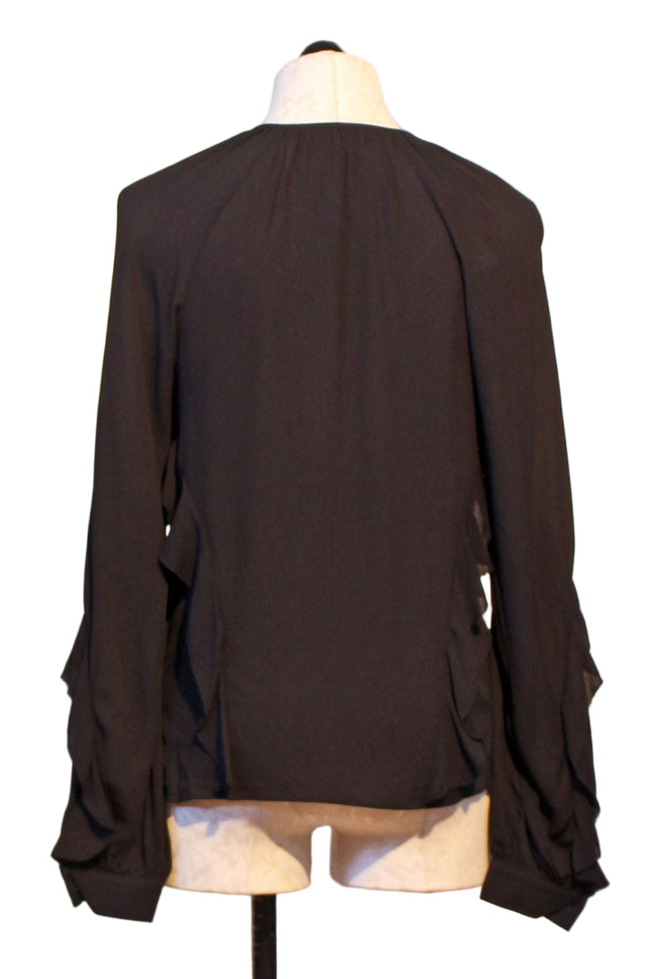 back view of Black Ruffled The Because Of You Top by Favorite Daughter
