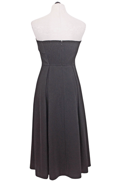 back view of Black Belle Dress by Rue Sophie is a strapless dress with a fold over neckline