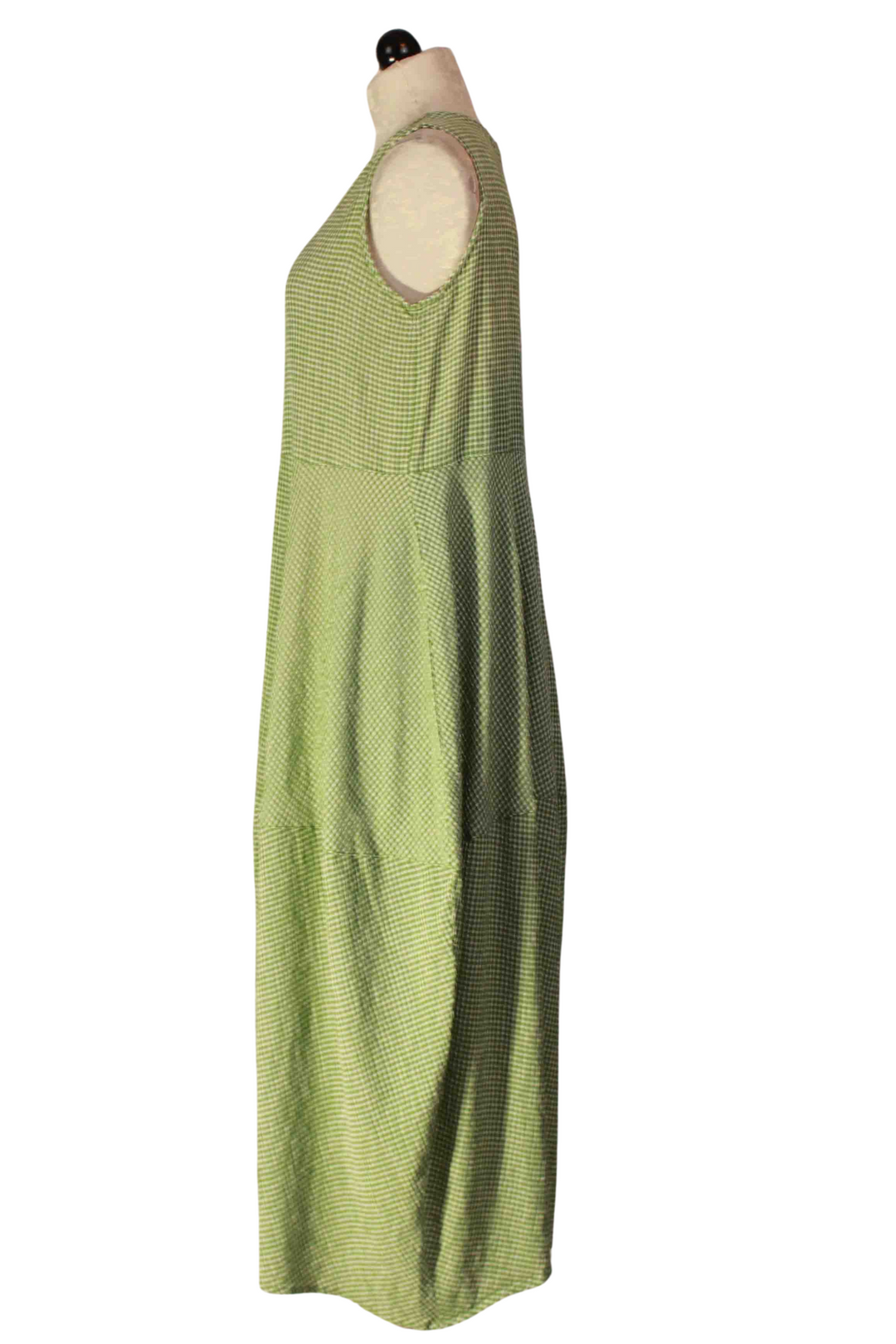 side view of Seamed Bubble Dress by Cut Loose in a Fava Green Crinkle Check