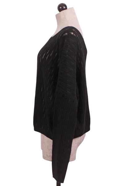 side view of Black Cropped Pointelle Nala Sexy V-Back Cashmere Sweater by Crush