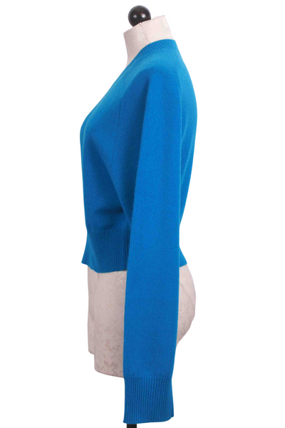 side view of Wave Colored Drake High V Neck Sweater by Crush