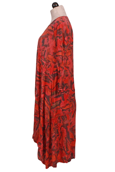 side view of Coral Abstract Crinkle 3/4 Sleeve Hi Low Dress by Reina Lee