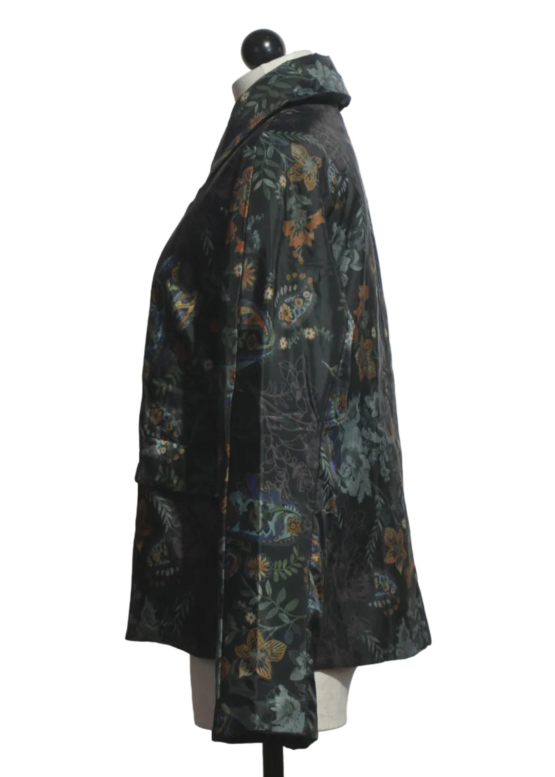 side view of The Lightweight, Packable, Reversible Puffer by Johnny Was in the Solana Scarf Print and Solid Black on the reverse side