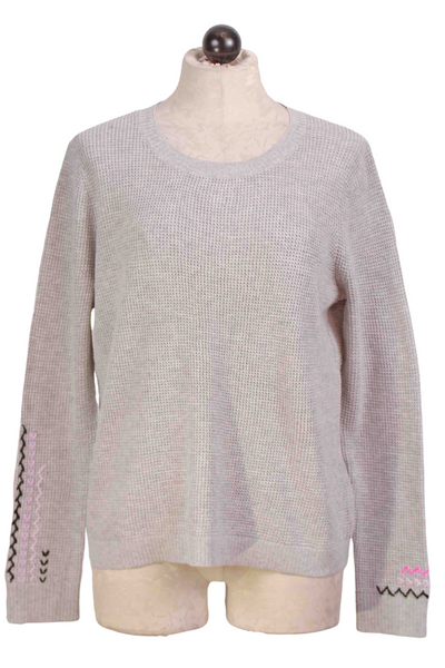 Platinum Let's Meet Sweater by Lisa Todd with multicolored Zig-Zag Stitching down the sleeves
