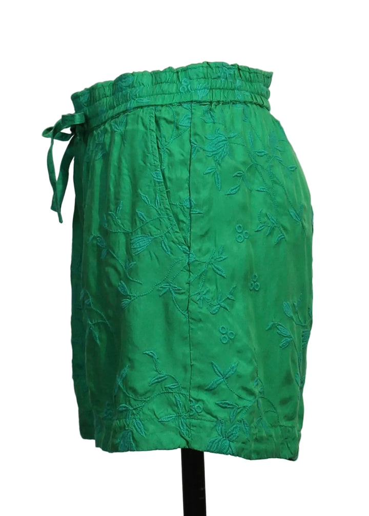 side view of  Audrey Eyelet Flower Short by Johnny Was in bright green 